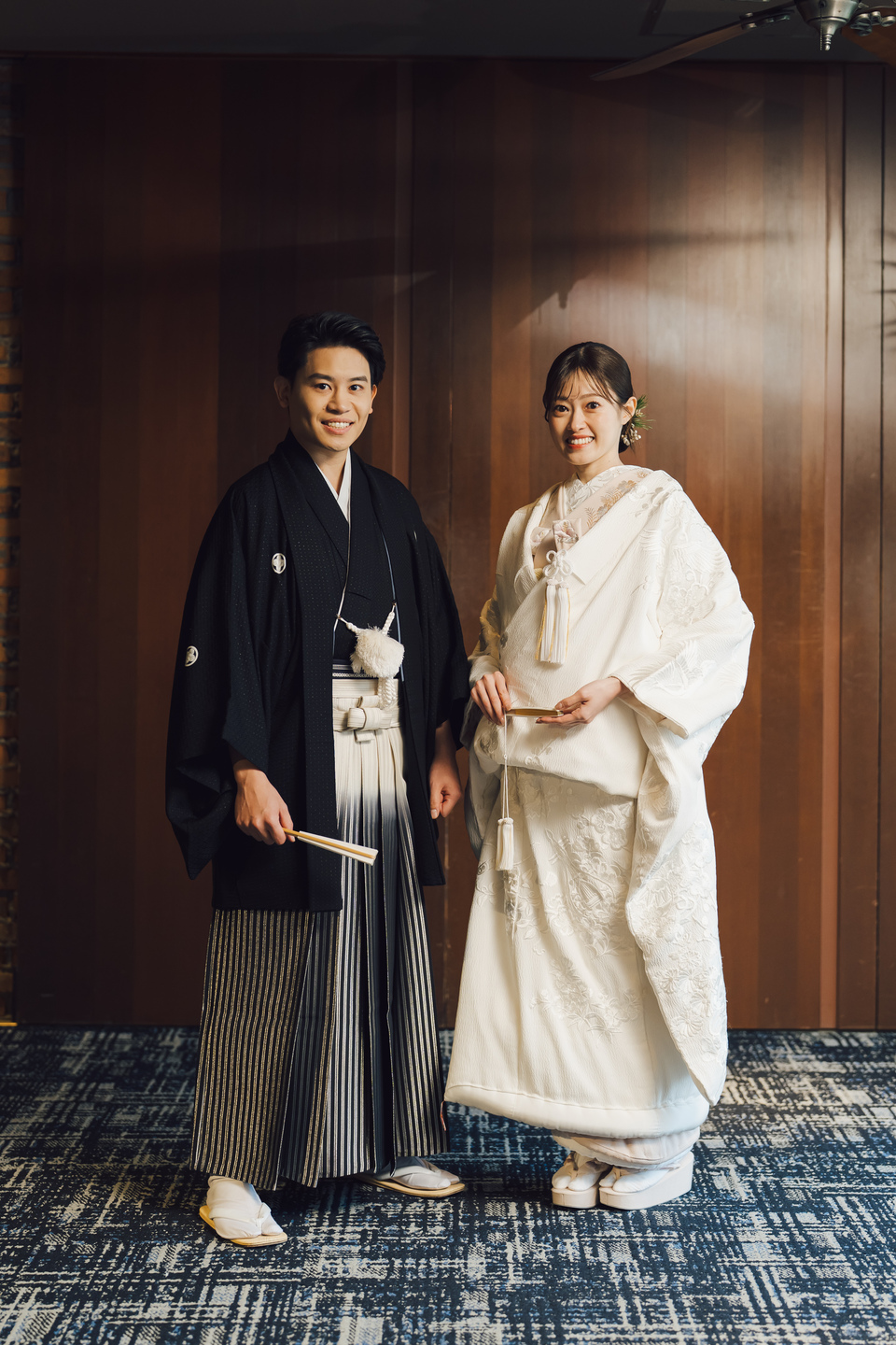 白無垢の和装小物には桃色を入れ、キュートな笑顔を見せる愛らしいご新婦様にぴったりの愛らしいコーディネートとなりました